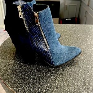 These ankle boots are denim and never worn.  I broke my foot - no more heels.